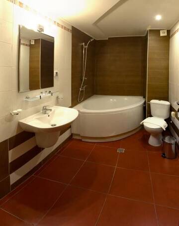Фото номера Двухместный номер Делюкс с 1 кроватью Отель Boutique Family Hotel VSK Kentavar г. Дряново 6